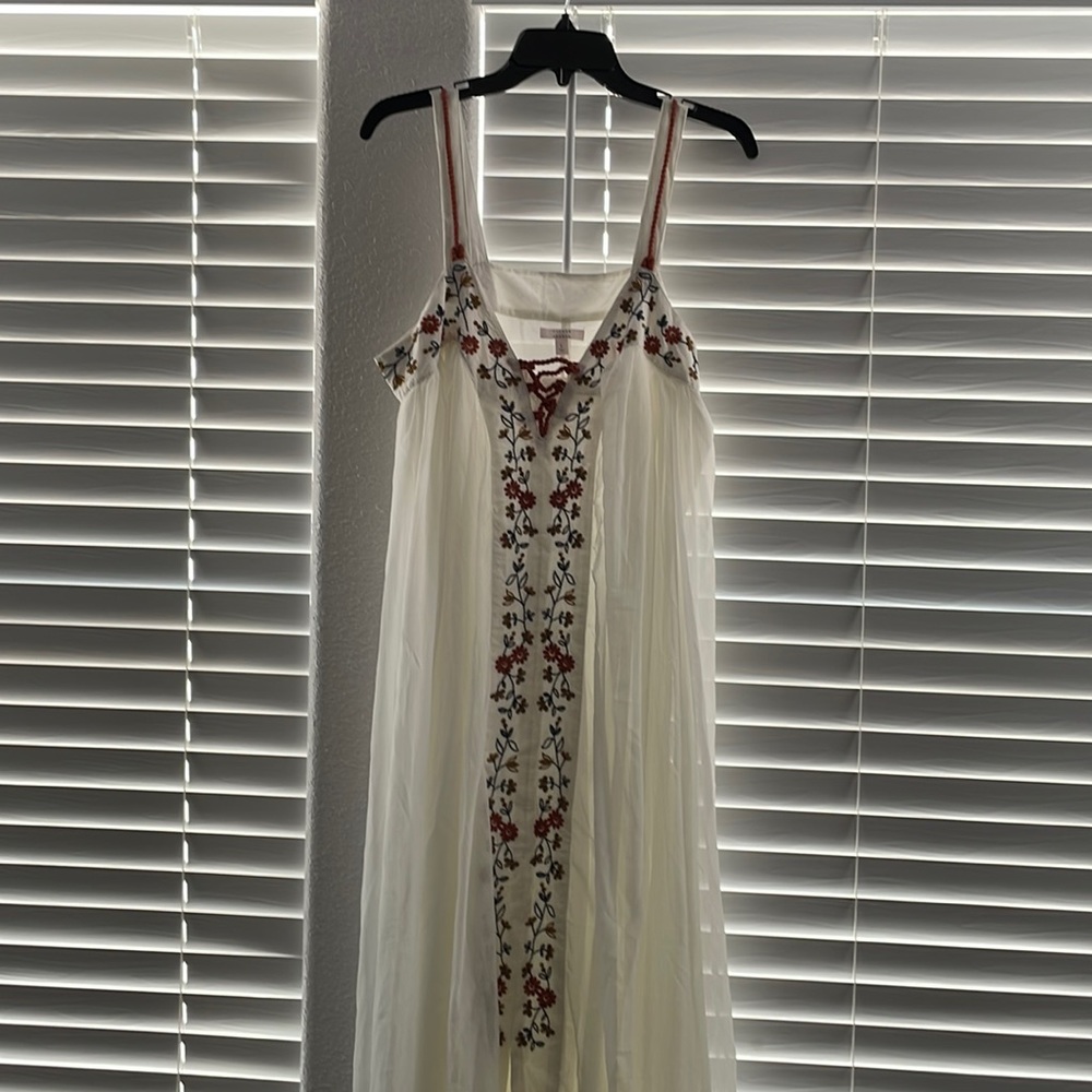 White maxi dress with floral detail